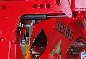Passenger side autoloader hose